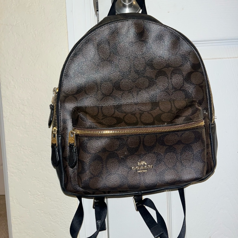 Coach Brown Backpack with Structured Design and Gold-Tone Hardware